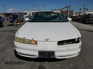 1998 Oldsmobile Intrigue GL z VIN 1G3WS52K2WF325982, wystawiony jako Copart lot #77172634 z przebiegiem 141 276 mil mil oraz Szkody całkowita. Historia ofert i sprzedaży dostępna na DreamBid. Obrazek 5.