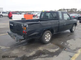 1996 Nissan Trucks 2WD XE with VIN 1N6SD16S5TC385180, listed as a IAAI auction lot 41345326 with 262,211 mi miles. Bid and sale history available at carsss.com. Image 4.