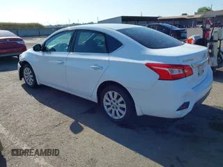 2018 Nissan Sentra S with VIN 3N1AB7AP0JY210675, listed as a IAAI auction lot 42128528 with 76,299 mi miles and . Bid and sale history available at DreamBid. Image 3.