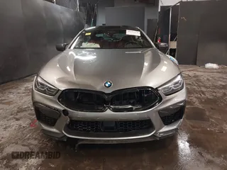 2022 BMW M8 Competition z VIN WBSGV0C04NCH71560, wystawiony jako IAAI lot #41542278 z przebiegiem 28 117 mil mil oraz . Historia ofert i sprzedaży dostępna na DreamBid. Obrazek 12.