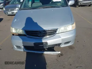 2004 Honda Odyssey EX z VIN 5FNRL186X4B061960, wystawiony jako IAAI lot #41384578 z przebiegiem 262 866 mil mil oraz . Historia ofert i sprzedaży dostępna na DreamBid. Obrazek 6.
