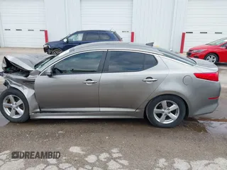 2015 Kia Optima LX z VIN 5XXGM4A78FG382856, wystawiony jako IAAI lot #42170669 z przebiegiem 101 964 mil mil oraz . Historia ofert i sprzedaży dostępna na DreamBid. Obrazek 14.