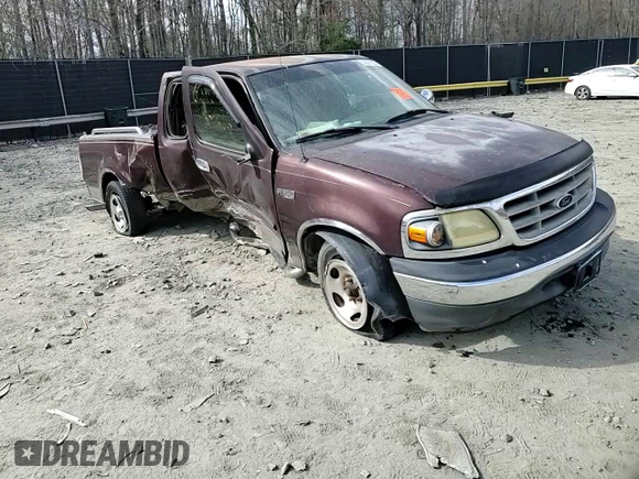 2001 Ford F-150 XL with VIN 1FTZX17211NA94099, listed as a Copart auction lot 50587055 with Not provided miles and Salvage title. Bid and sale history available at DreamBid. Image 10.