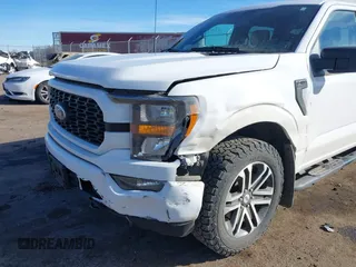 2023 Ford F-150 XL with VIN 1FTFW1E5XPKE92229, listed as a IAAI auction lot 41686774 with 58,008 mi miles. Bid and sale history available at carsss.com. Image 6.