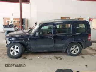 2012 Jeep Liberty Sport z VIN 1C4PJMAK9CW158308, wystawiony jako IAAI lot #41665502 z przebiegiem 125 595 mil mil oraz . Historia ofert i sprzedaży dostępna na DreamBid. Obrazek 14.