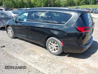 2022 Chrysler Pacifica Touring L with VIN 2C4RC1BG3NR106311, listed as a IAAI auction lot 42158651 with 68,473 mi miles and . Bid and sale history available at DreamBid. Image 3.
