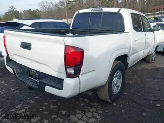 2021 Toyota Tacoma 2WD SR with VIN 3TYAX5GNXMT014431, listed as a IAAI auction lot 41452734 with 64,254 mi miles. Bid and sale history available at carsss.com. Image 4.