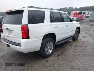 2017 Chevrolet Tahoe LS with VIN 1GNSCAKC3HR265961, listed as a IAAI auction lot 41426651 with 117,331 mi miles and . Bid and sale history available at DreamBid. Image 4.