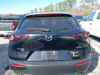 2023 Mazda CX-30 S Premium with VIN 3MVDMBDM7PM528297, listed as a IAAI auction lot 41637542 with 48,935 mi miles and . Bid and sale history available at DreamBid. Image 16.