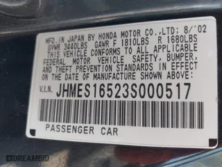 2003 Honda Civic LX with VIN JHMES16523S000517, listed as a IAAI auction lot 42012871 with 158,253 mi miles. Bid and sale history available at carsss.com. Image 9.