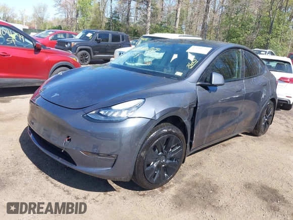 2022 Tesla Model Y Long Range z VIN 7SAYGAEE9NF574634, wystawiony jako IAAI lot #42040719 z przebiegiem 29 675 mil mil oraz . Historia ofert i sprzedaży dostępna na DreamBid. Obrazek 2.