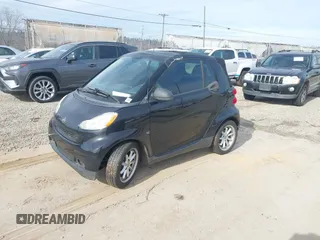 2009 Smart fortwo Passion z VIN WMEEK31X29K288815, wystawiony jako IAAI lot #40953956 z przebiegiem Nie podano mil oraz . Historia ofert i sprzedaży dostępna na DreamBid. Obrazek 2.
