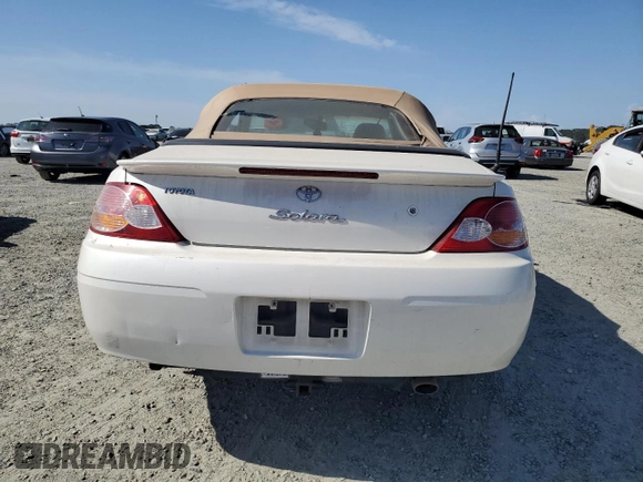 2002 Toyota Solara SE z VIN 2T1FF28P22C595397, wystawiony jako Copart lot #58276695 z przebiegiem Nie podano mil oraz Szkoda całkowita • Salvage title. Historia ofert i sprzedaży dostępna na DreamBid. Obrazek 6.