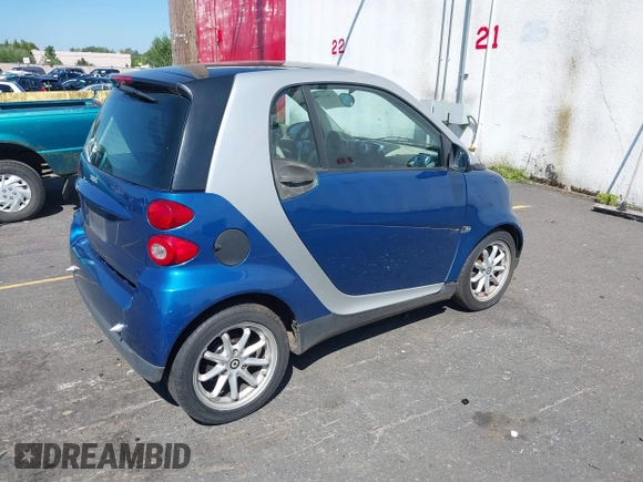 2009 Smart fortwo Pure with VIN WMEEJ31X19K243304, listed as a IAAI auction lot 42860139 with 119,617 mi miles and . Bid and sale history available at DreamBid. Image 4.