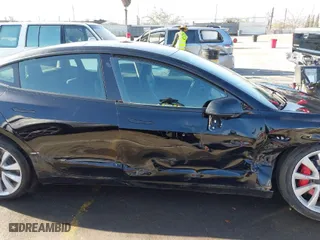 2019 Tesla Model 3 Long Range with VIN 5YJ3E1EB9KF186737, listed as a IAAI auction lot 42022761 with 43,742 mi miles. Bid and sale history available at carsss.com. Image 13.
