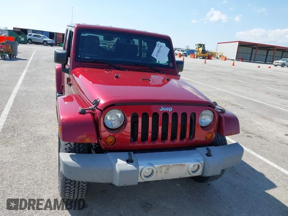 2013 Jeep Wrangler Unlimited Sahara с VIN 1C4BJWEG5DL569977, выставлен на аукционе IAAI как лот 41980394 с пробегом 145 571 миль миль и . История ставок и продаж доступна на DreamBid. Изображение 12.