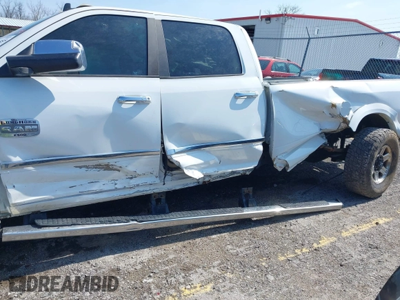 2013 Ram 2500 Laramie Longhorn with VIN 3C6UR5LL7DG522840, listed as a IAAI auction lot 41970385 with 145,144 mi miles and . Bid and sale history available at DreamBid. Image 18.