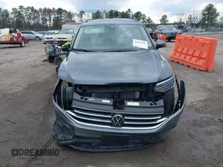 2024 Volkswagen Tiguan S z VIN 3VVRB7AX8RM111008, wystawiony jako IAAI lot #41857646 z przebiegiem 23 099 mil mil oraz . Historia ofert i sprzedaży dostępna na DreamBid. Obrazek 13.