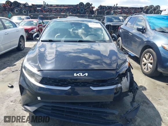 2022 Kia Forte LXS z VIN 3KPF24AD8NE419189, wystawiony jako IAAI lot #41983931 z przebiegiem 120 000 mil mil oraz . Historia ofert i sprzedaży dostępna na DreamBid. Obrazek 12.