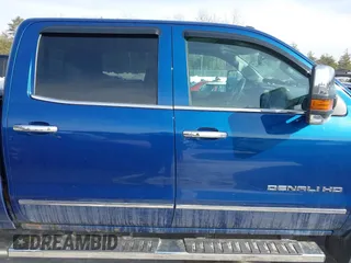 2015 GMC Sierra 2500HD available WiFi Denali with VIN 1GT120E8XFF623208, listed as a IAAI auction lot 41607260 with 98,032 mi miles. Bid and sale history available at carsss.com. Image 13.