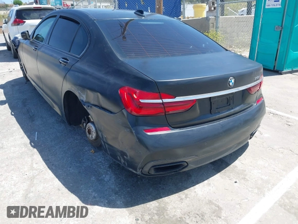 2018 BMW 7 Series 750i with VIN WBA7F0C51JGM23504, listed as a IAAI auction lot 39379378 with 82,251 mi miles. Bid and sale history available at carsss.com. Image 3.