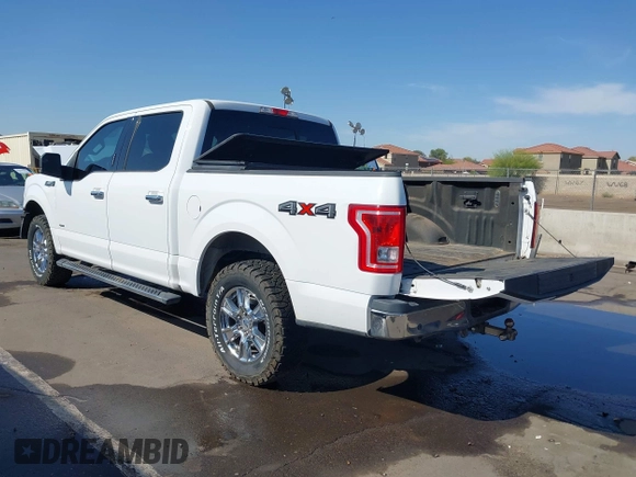 2015 Ford F-150 XLT with VIN 1FTEW1EP0FKE42273, listed as a IAAI auction lot 41988265 with 119,483 mi miles. Bid and sale history available at carsss.com. Image 3.