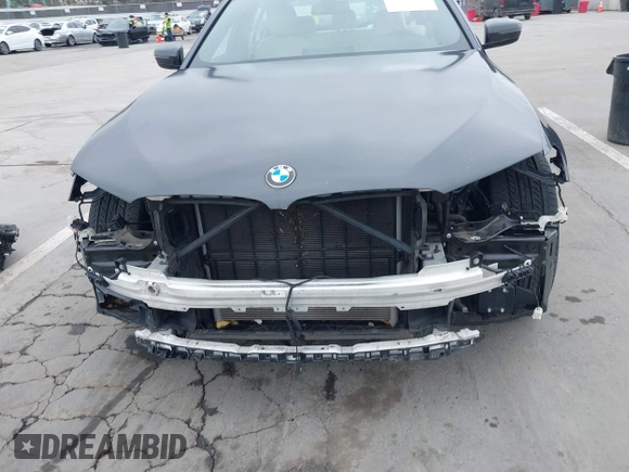 2019 BMW 5 Series 530e with VIN WBAJA9C56KB388241, listed as a IAAI auction lot 42181217 with 69,805 mi miles and . Bid and sale history available at carsss.com. Image 13.