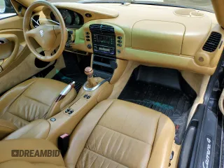 2000 Porsche 911 z VIN WP0CA2998YS650752, wystawiony jako Copart lot #58339415 z przebiegiem 68 854 mil mil oraz Szkoda całkowita • Salvage title. Historia ofert i sprzedaży dostępna na DreamBid. Obrazek 8.