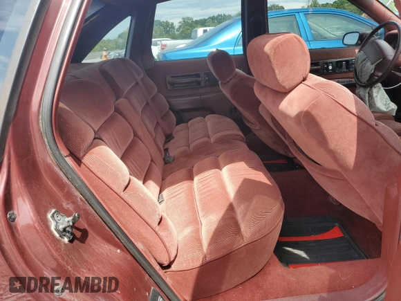 1991 Chevrolet Caprice z VIN 1G1BN53E9MW187619, wystawiony jako Copart lot #55291845 z przebiegiem 1 433 530 mil mil oraz Szkoda całkowita • Salvage title. Historia ofert i sprzedaży dostępna na DreamBid. Obrazek 10.