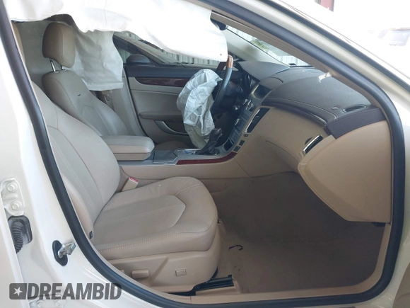 2013 Cadillac CTS Premium z VIN 1G6DS5E30D0105240, wystawiony jako IAAI lot #42145007 z przebiegiem 100 893 mil mil oraz . Historia ofert i sprzedaży dostępna na DreamBid. Obrazek 5.