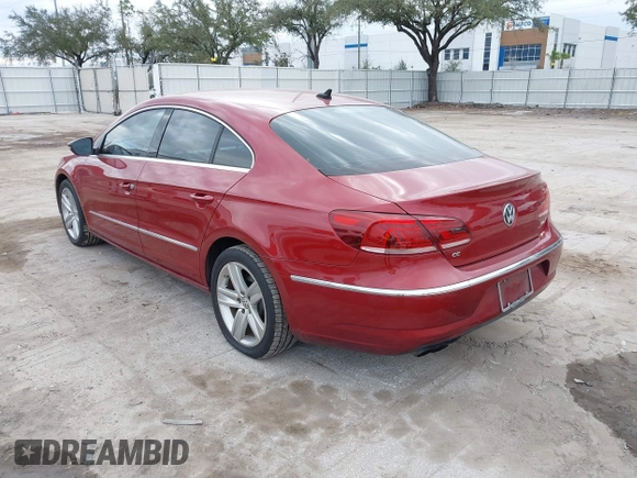2014 Volkswagen CC Sport with VIN WVWBN7AN0EE527558, listed as a IAAI auction lot 41336204 with 130,005 mi miles and . Bid and sale history available at DreamBid. Image 3.