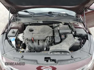 2019 Kia Optima LX z VIN 5XXGT4L38KG284160, wystawiony jako Copart lot #57289035 z przebiegiem 57 818 mil mil oraz Szkoda całkowita • Salvage title. Historia ofert i sprzedaży dostępna na DreamBid. Obrazek 11.