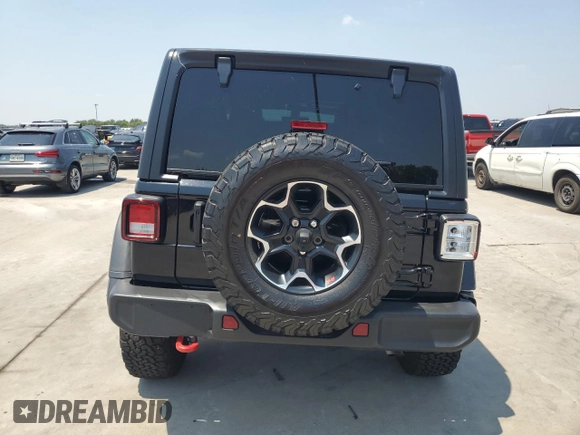 2023 Jeep Wrangler Rubicon с VIN 1C4HJXCG6PW679118, выставлен на аукционе Copart как лот 66469354 с пробегом 5 038 миль миль и Списание • Salvage title. История ставок и продаж доступна на DreamBid. Изображение 6.