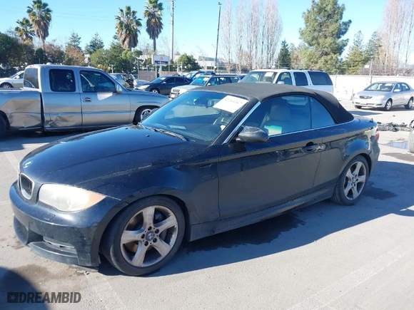 2009 BMW 1 Series 135i with VIN WBAUN93529VK40520, listed as a IAAI auction lot 41266367 with 147,650 mi miles. Bid and sale history available at carsss.com. Image 2.