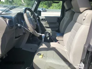 2007 Jeep Wrangler Sahara z VIN 1J8FA54137L209032, wystawiony jako Copart lot #56502475 z przebiegiem 129 402 mil mil oraz Szkoda całkowita • Salvage title. Historia ofert i sprzedaży dostępna na DreamBid. Obrazek 7.