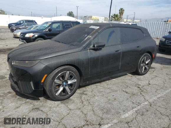2023 BMW iX xDrive50 with VIN WB523CF0XPCL59062, listed as a Copart auction lot 43813935 with 7,788 mi miles and Salvage Title. Bid and sale history available at carsss.com. Image 1.