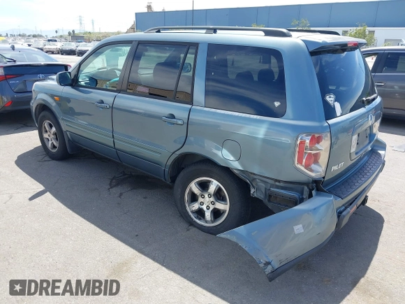 2007 Honda Pilot EX with VIN 2HKYF18447H520522, listed as a IAAI auction lot 42018937 with 128,401 mi miles. Bid and sale history available at carsss.com. Image 3.
