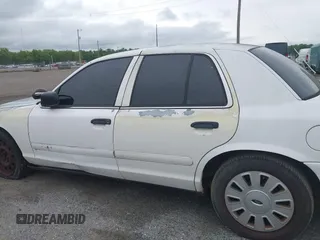 2007 Ford Police Interceptor z VIN 2FAFP71W27X105075, wystawiony jako IAAI lot #42219813 z przebiegiem Nie podano mil oraz . Historia ofert i sprzedaży dostępna na DreamBid. Obrazek 13.