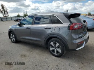 2017 Kia Niro Touring Launch Edition with VIN KNDCC3LC2H5037562, listed as a Copart auction lot 60726424 with 148,023 mi miles and Clean Title. Bid and sale history available at carsss.com. Image 2.
