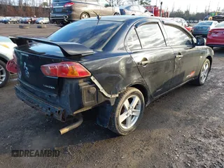 2008 Mitsubishi Lancer DE z VIN JA3AU26U58U004840, wystawiony jako IAAI lot #41515756 z przebiegiem 117 996 mil mil oraz . Historia ofert i sprzedaży dostępna na DreamBid. Obrazek 4.