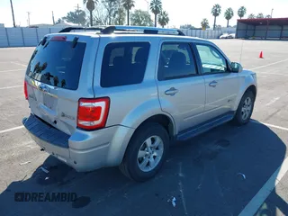 2009 Ford Escape Hybrid with VIN 1FMCU59349KA94375, listed as a IAAI auction lot 41865743 with 127,538 mi miles and . Bid and sale history available at DreamBid. Image 4.