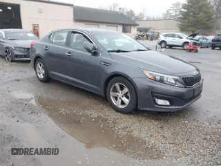 2015 Kia Optima LX with VIN KNAGM4A73F5625605, listed as a IAAI auction lot 41924411 with 104,153 mi miles. Bid and sale history available at carsss.com. Image 1.