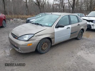 2003 Ford Focus LX with VIN 1FAFP33P33W267575, listed as a IAAI auction lot 41804406 with 106,957 mi miles and . Bid and sale history available at carsss.com. Image 2.