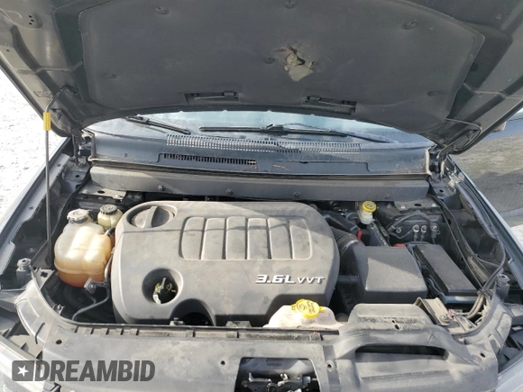 2014 Dodge Journey Crossroad with VIN 3C4PDCGG5ET283724, listed as a Copart auction lot 43251245 with 120,571 mi miles and Salvage title. Bid and sale history available at DreamBid. Image 12.