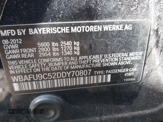 2013 BMW 5 Series 550i xDrive with VIN WBAFU9C52DDY70807, listed as a IAAI auction lot 41663855 with 92,009 mi miles and . Bid and sale history available at carsss.com. Image 9.