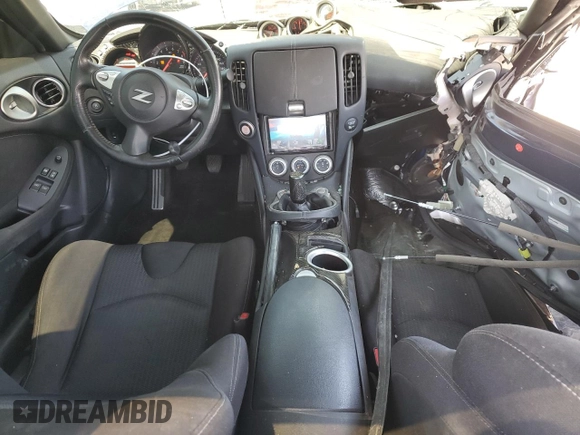 2016 Nissan 370Z z VIN JN1AZ4EH9GM933658, wystawiony jako Copart lot #48760215 z przebiegiem 70 682 mil mil oraz Szkoda całkowita • Salvage title. Historia ofert i sprzedaży dostępna na DreamBid. Obrazek 8.