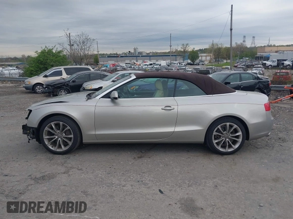 2014 Audi A5 Premium Plus z VIN WAULFAFH7EN001894, wystawiony jako IAAI lot #42082669 z przebiegiem 78 624 mil mil oraz . Historia ofert i sprzedaży dostępna na DreamBid. Obrazek 14.
