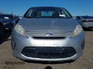 2013 Ford Fiesta S with VIN 3FADP4AJ6DM223132, listed as a IAAI auction lot 42317500 with 104,003 mi miles and . Bid and sale history available at DreamBid. Image 6.