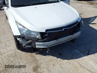 2014 Chevrolet Cruze 1LT with VIN 1G1PC5SB0E7261699, listed as a IAAI auction lot 42011008 with 164,699 mi miles and . Bid and sale history available at DreamBid. Image 6.