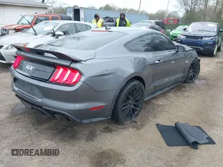 2021 Ford Mustang GT z VIN 1FA6P8CF4M5148249, wystawiony jako IAAI lot #41949502 z przebiegiem 20 993 mil mil oraz . Historia ofert i sprzedaży dostępna na DreamBid. Obrazek 4.